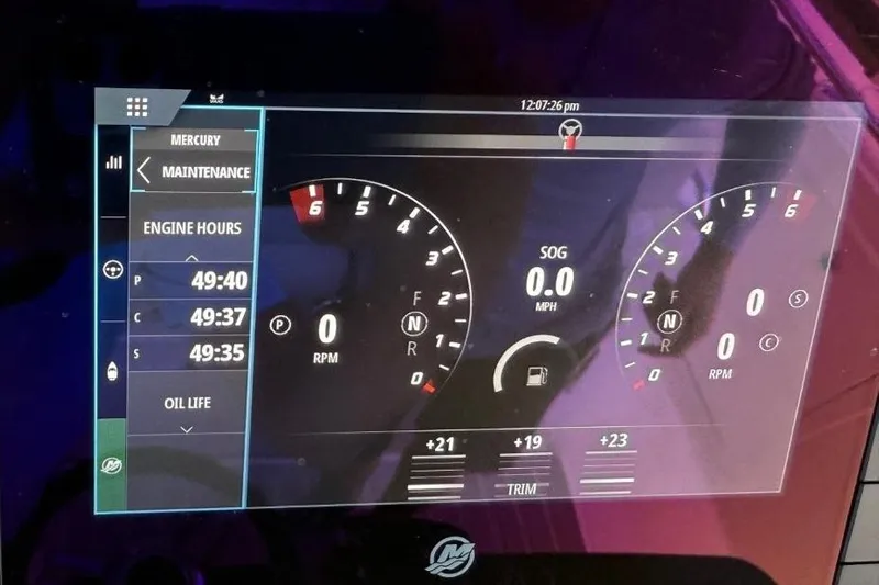 Diamond Pearl Yacht Photos Pics Dashboard display of 2024 Tiara Yachts 38 LS showing engine hours and RPM gauges.