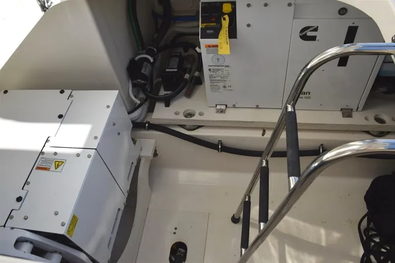 Diamond Pearl Yacht Photos Pics Engine compartment of 2024 Tiara Yachts 38 LS with Cummins/Onan diesel generator and SeaKeeper gyro stabilizer.