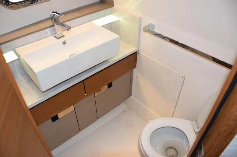 Diamond Pearl Yacht Photos Pics Nicely finished bathroom with door and freshwater toilet.