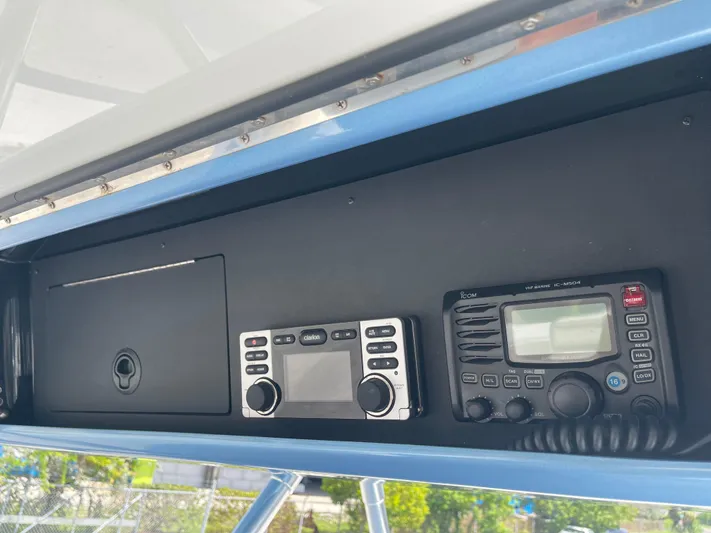  Yacht Photos Pics 2013 Bahama Open Fisherman boat dashboard with marine radio and control panel.