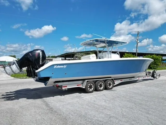  Yacht Photos Pics 2013 Bahama Open Fisherman boat on a trailer with triple Mercury outboard engines.