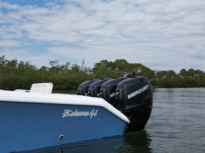  Yacht Photos Pics 2013 Bahama Open Fisherman boat with Mercury engines on the water.