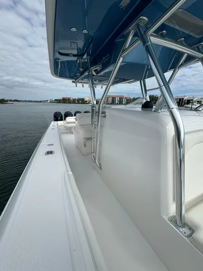  Yacht Photos Pics 2013 Bahama Open Fisherman boat with blue T-top and stainless steel frame.