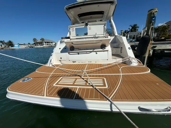 I'll Have Another Yacht Photos Pics Rear view of a 2016 Sea Ray Sundancer 350 yacht in harbor.