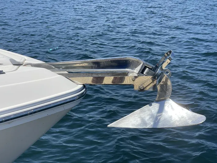  Yacht Photos Pics Anchor of 2007 Rinker 350 Express Cruiser on calm water.