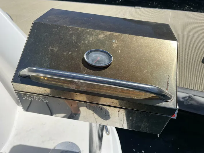  Yacht Photos Pics Stainless steel grill on 2007 Rinker 350 Express Cruiser boat deck.