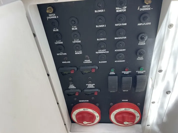  Yacht Photos Pics Control panel of a 2007 Rinker 350 Express Cruiser with various switches and dials.