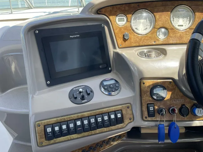  Yacht Photos Pics 2007 Rinker 350 Express Cruiser dashboard with navigation system and control panel.