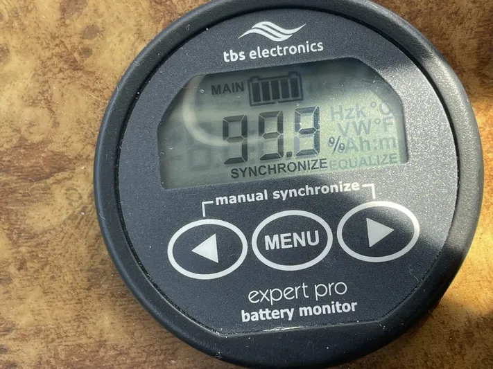  Yacht Photos Pics TBS Electronics Expert Pro battery monitor displaying 99.8% charge on a 2007 Rinker 350 Express Cruiser.