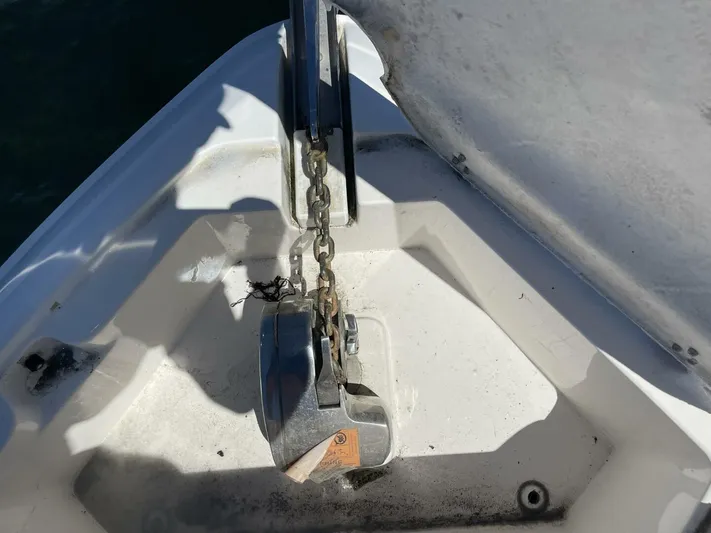  Yacht Photos Pics Anchor chain mechanism on a 2007 Rinker 350 Express Cruiser boat.