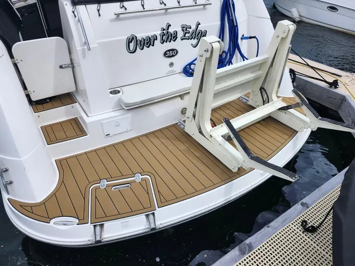  Yacht Photos Pics 2007 Rinker 350 Express Cruiser with swim platform and custom wood decking.