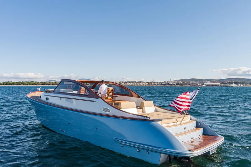  Yacht Photos Pics 2023 Vento V40 Retro Classic Open boat cruising on a sunny day.