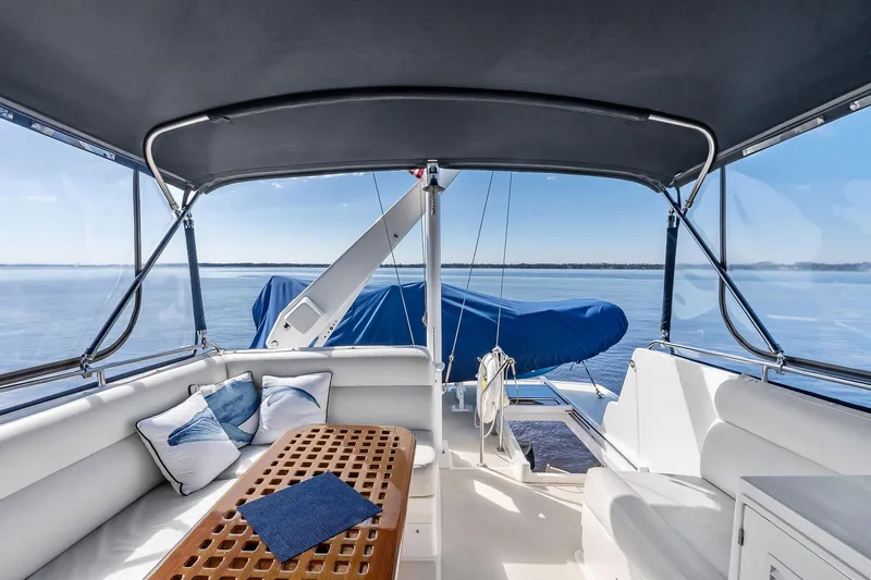 Draagen Yacht Photos Pics Luxurious 2006 Grand Banks Europa 47 yacht interior with ocean view and comfortable seating.