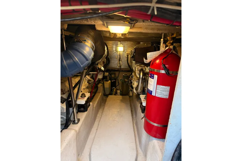 Sea Trials Yacht Photos Pics Engine room of 2007 Sea Ray 44 Sedan Bridge with fire extinguisher and equipment.
