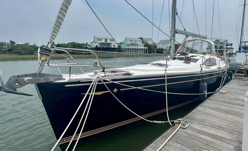 Charisapa Yacht Photos Pics 2012 Jeanneau 50 DS sailboat docked, showcasing sleek design and modern features.