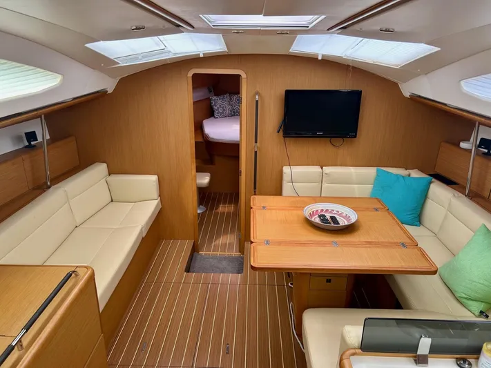 Charisapa Yacht Photos Pics Interior of 2012 Jeanneau 50 DS yacht with cozy seating and modern amenities.
