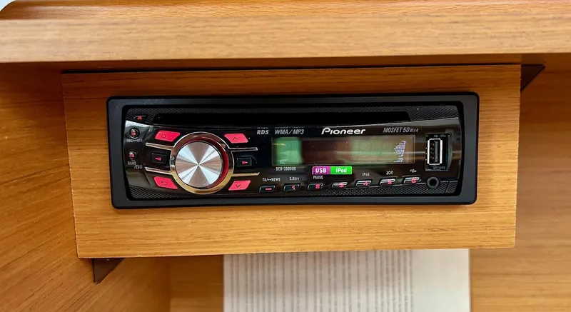 Charisapa Yacht Photos Pics Pioneer stereo system in 2012 Jeanneau 50 DS yacht interior.