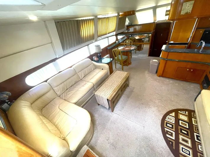 Yacht Photos Pics Interior of 2000 Carver 506 Motor Yacht with beige seating and wooden furnishings.