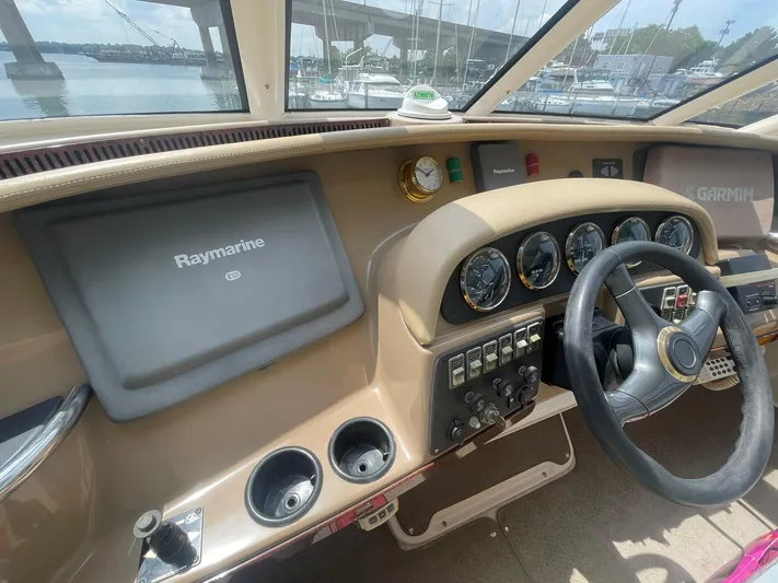  Yacht Photos Pics Helm of 2000 Carver 506 Motor Yacht with Raymarine and Garmin navigation systems.