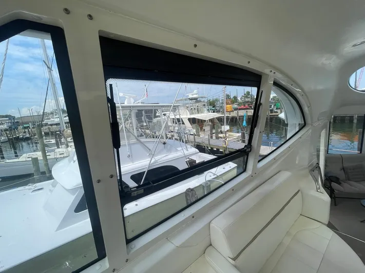  Yacht Photos Pics Interior view of 2000 Carver 506 Motor Yacht with marina backdrop.