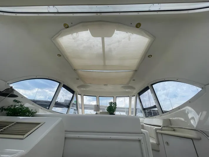  Yacht Photos Pics Interior view of 2000 Carver 506 Motor Yacht with large windows and skylight.
