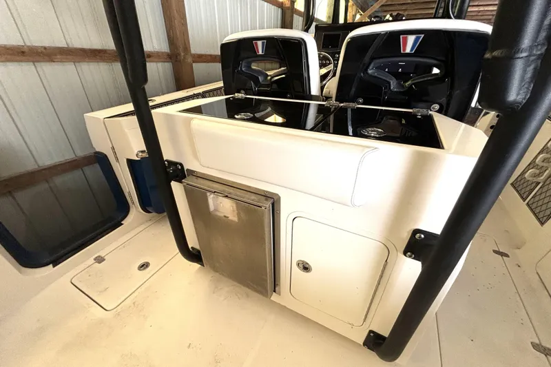  Yacht Photos Pics 2019 Wellcraft 302 Fisherman boat interior with dual seats and storage compartments.