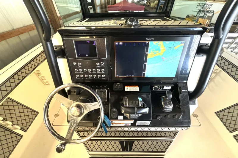  Yacht Photos Pics 2019 Wellcraft 302 Fisherman dashboard with navigation and control systems.