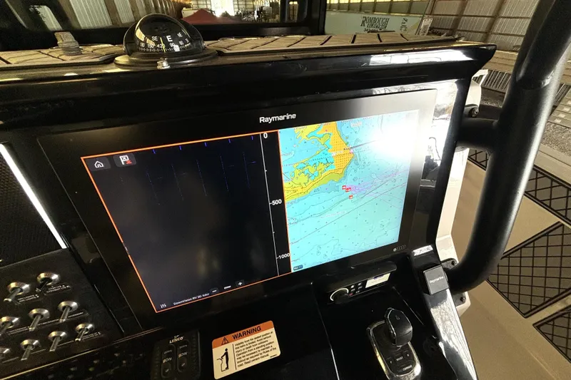  Yacht Photos Pics Raymarine navigation display on 2019 Wellcraft 302 Fisherman boat dashboard.