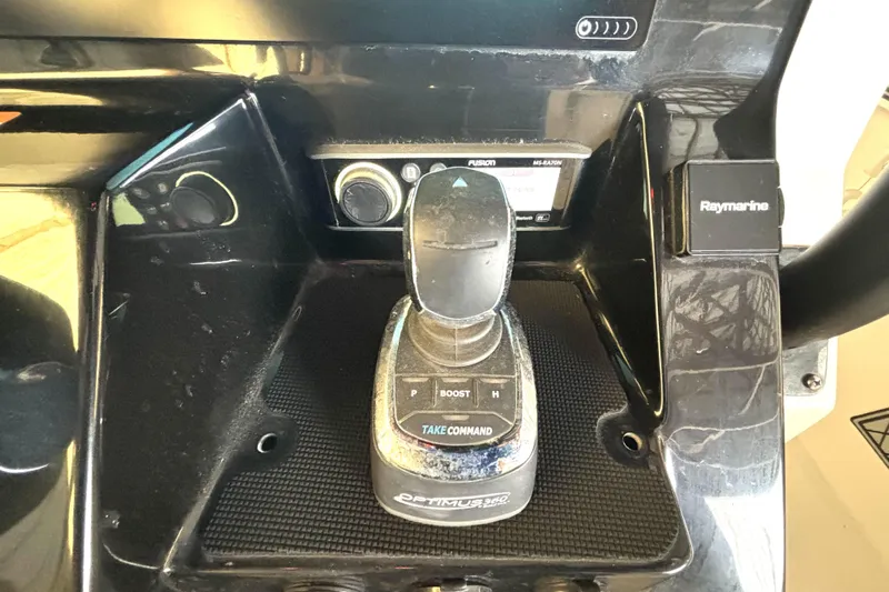  Yacht Photos Pics 2019 Wellcraft 302 Fisherman boat control panel with joystick and Raymarine system.