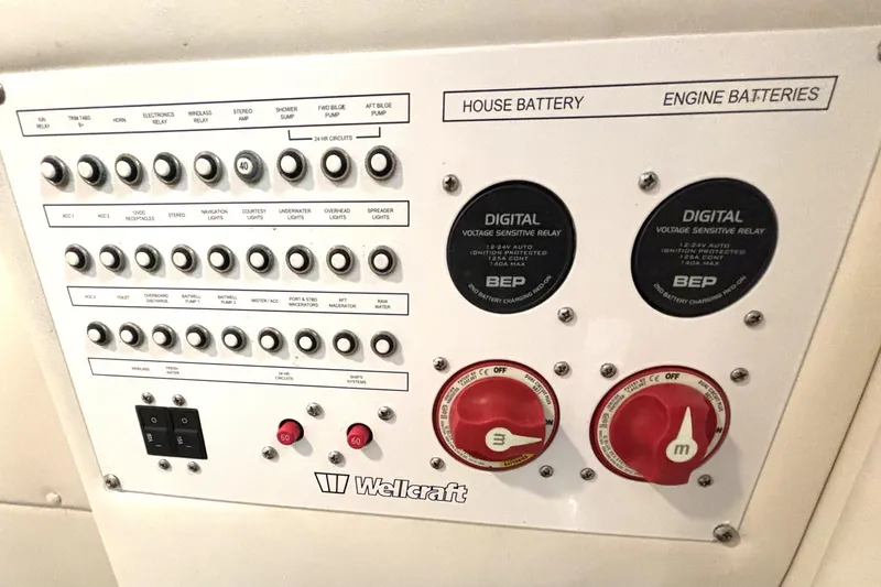  Yacht Photos Pics Control panel of 2019 Wellcraft 302 Fisherman boat with switches and battery controls.