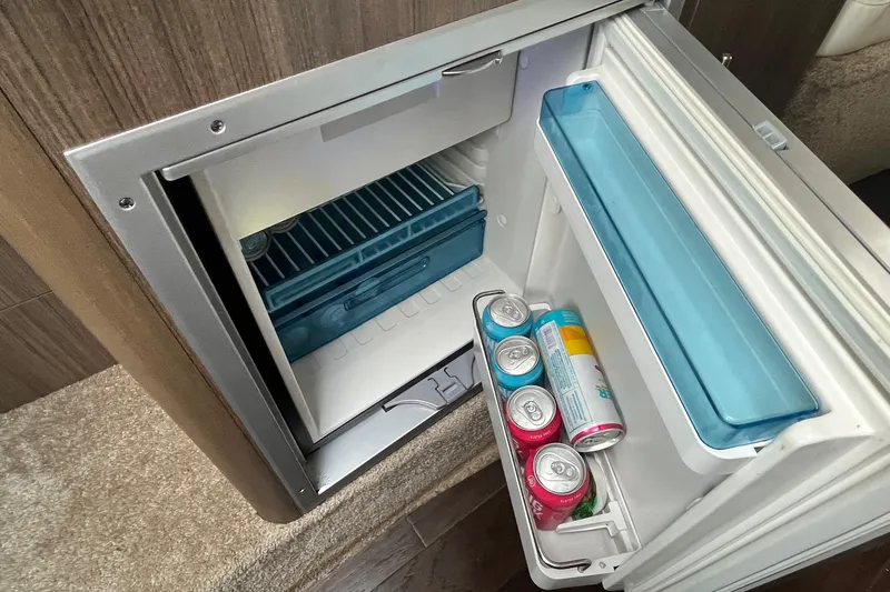  Yacht Photos Pics Open mini fridge in 2020 Rinker 290 EX boat with drinks inside.