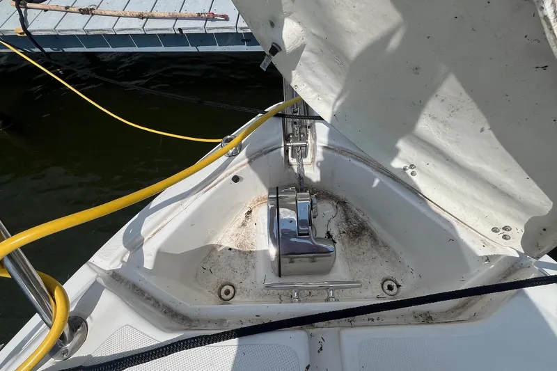  Yacht Photos Pics 2020 Rinker 290 EX boat anchor compartment with open hatch and visible cables.