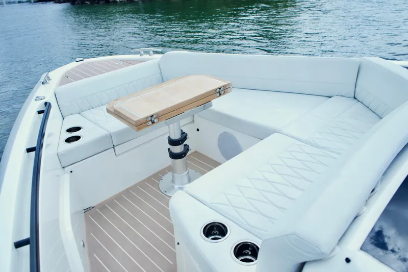 Sierra Tango VI Yacht Photos Pics Luxurious seating area on the 2025 Saxdor 400 GTO boat with elegant design.