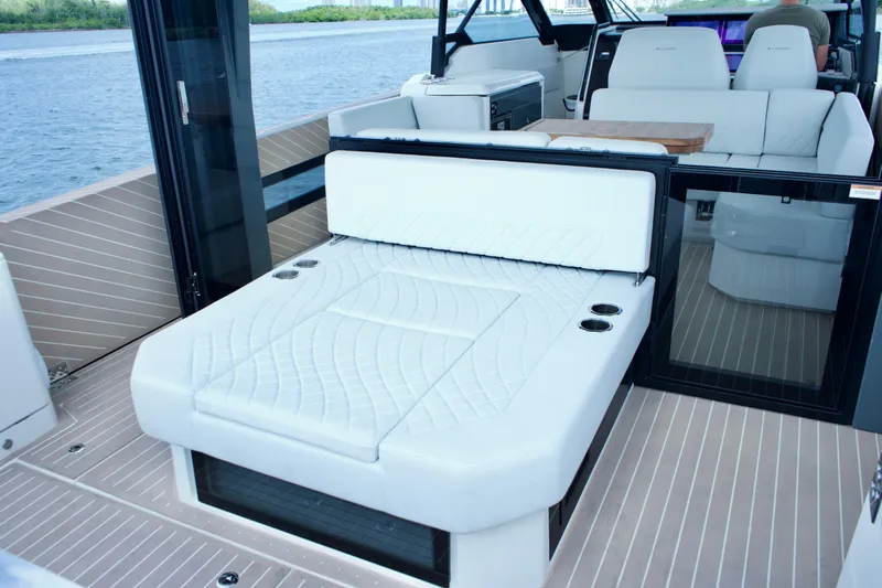 Sierra Tango VI Yacht Photos Pics Luxurious interior of 2025 Saxdor 400 GTO yacht with white seating and modern design.