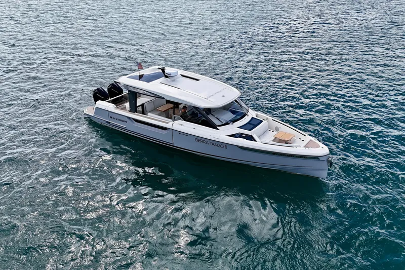 Sierra Tango VI Yacht Photos Pics 2025 Saxdor 400 GTO luxury boat cruising on open water.