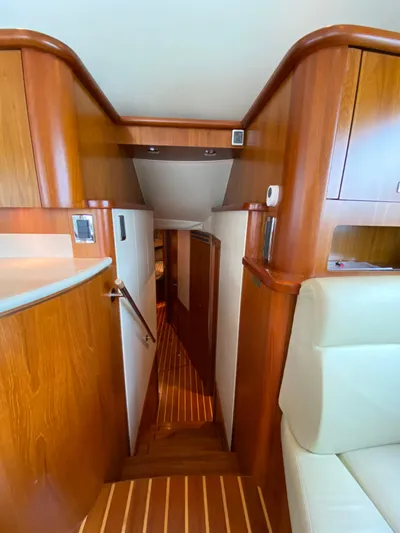  Yacht Photos Pics Interior of 2012 Tiara Yachts 48 Convertible with wood finish and modern design.