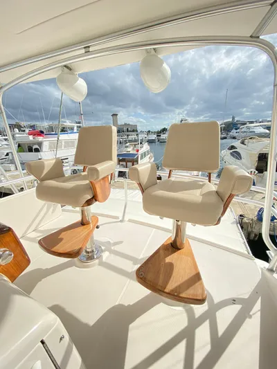  Yacht Photos Pics Luxury seating on 2012 Tiara Yachts 48 Convertible, docked at marina.