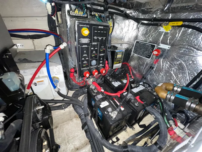  Yacht Photos Pics Engine compartment of a 2013 Rinker 310 Express Cruiser with batteries and wiring.