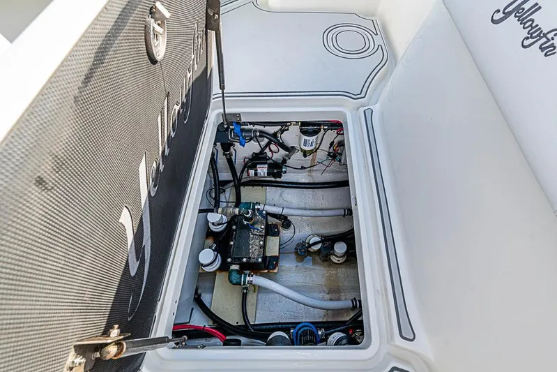 Quest Yacht Photos Pics 2011 Yellowfin 39 Offshore boat interior showing open hatch with visible wiring and components.