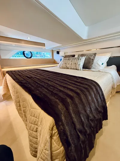 La Vida Boca Yacht Photos Pics Luxurious bedroom interior of 2019 Sealine F430 yacht with elegant bedding and modern design.
