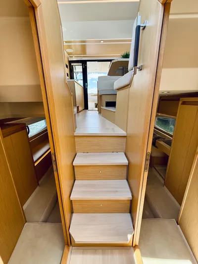 La Vida Boca Yacht Photos Pics 2019 Sealine F430 yacht interior with wooden stairs and modern design.