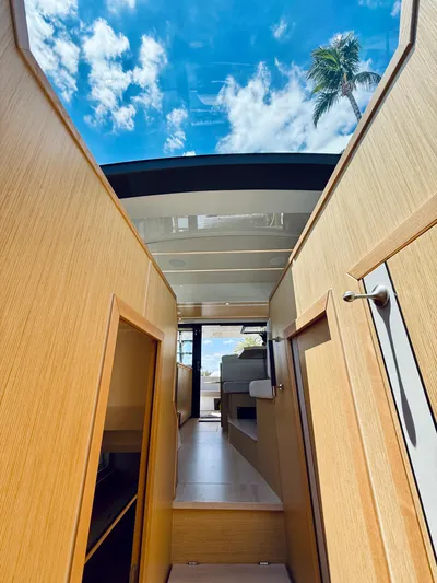 La Vida Boca Yacht Photos Pics Interior view of 2019 Sealine F430 yacht with wooden finish and skylight.