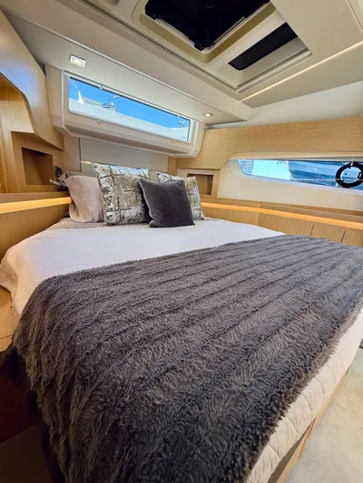 La Vida Boca Yacht Photos Pics Luxurious 2019 Sealine F430 yacht bedroom with plush bedding and modern design.