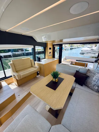 La Vida Boca Yacht Photos Pics Luxurious interior of 2019 Sealine F430 yacht with modern seating and waterfront view.