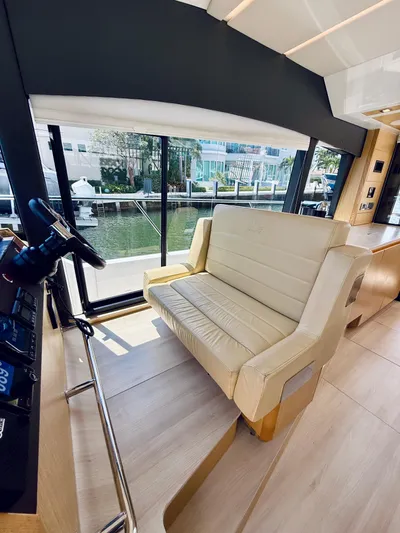 La Vida Boca Yacht Photos Pics Interior of 2019 Sealine F430 yacht with beige seating and large windows.