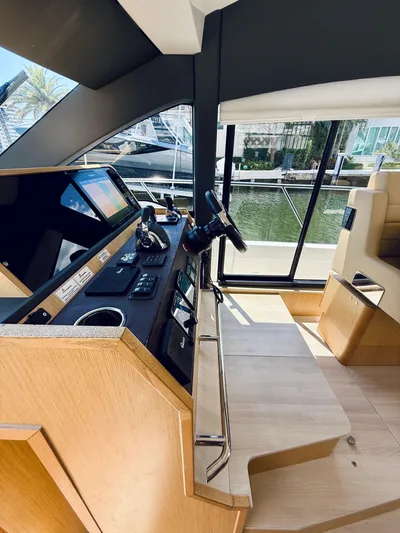 La Vida Boca Yacht Photos Pics 2019 Sealine F430 yacht helm with modern controls and waterfront view.