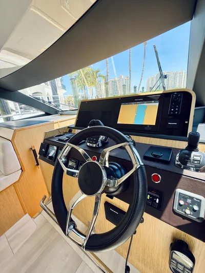 La Vida Boca Yacht Photos Pics 2019 Sealine F430 yacht helm with modern controls and navigation display.