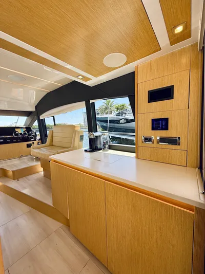 La Vida Boca Yacht Photos Pics Luxurious interior of 2019 Sealine F430 yacht with modern wood finishes and sleek design.