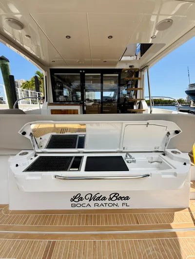 La Vida Boca Yacht Photos Pics 2019 Sealine F430 yacht deck with open storage, docked in Boca Raton, FL.