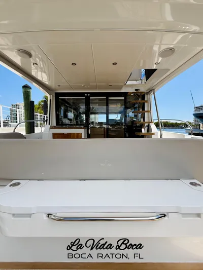 La Vida Boca Yacht Photos Pics 2019 Sealine F430 yacht docked in Boca Raton, Florida, with spacious deck and modern design.